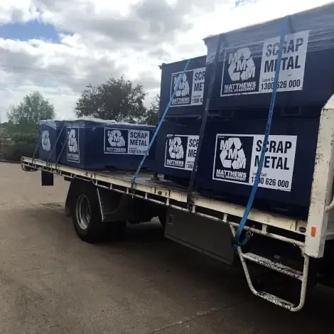 delivering scrap metal bins